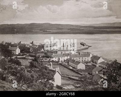 A late 19th century view of the harbour's began in 1873 in Ardrishaig, a coastal village on Loch Gilp, at the southern (eastern) entrance to the Crinan Canal in Argyll and Bute in the west of Scotland. Stock Photo