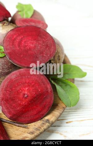 Ripe red beet on white wooden table Stock Photo