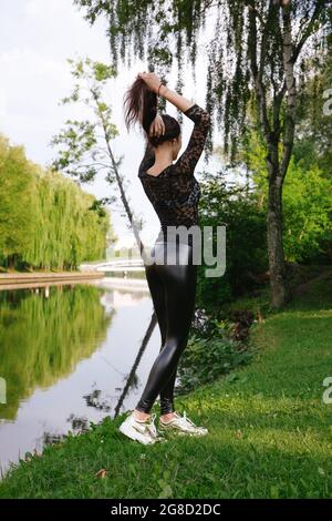 A girl in black leggings - Playground