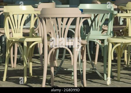 Naxos island, Greece. Old town cafe bar. Detailed close up view of of tables and chairs.  Landscape aspect Stock Photo