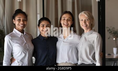 Diverse team of female business leaders standing together Stock Photo