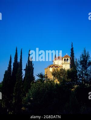 Orthodox Byzantine church, cypresses trees, sunset, New Epidaurus, Argolis, Peloponnese, Greece, Europe, Stock Photo