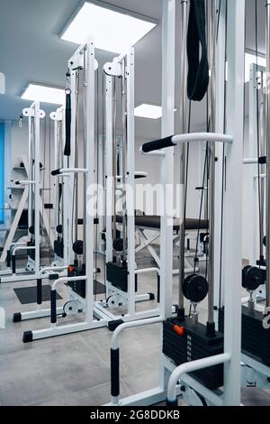 Close up rehabilitation center equipment in empty modern interior of physical therapy clinic room Stock Photo