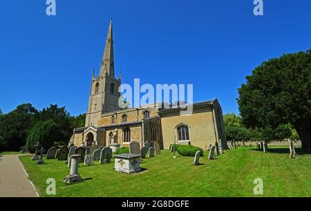 St Margarets church at Hemmingford Abbots Cambridgeshire England blue sky and grave stones. Stock Photo