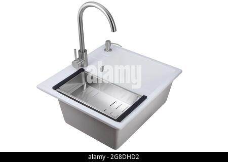 White artificial stone sink with tap and colander isolated on white background. Stock Photo