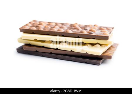 Chocolate bars with hazelnuts isolated on white background. Stock Photo