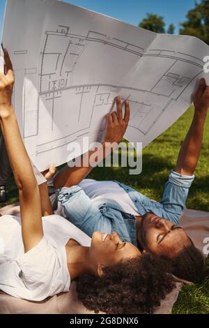 Gladsome student feeling excited about their new project Stock Photo