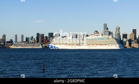 Seattle - July 18, 2021; Norwegian Encore and Majestic Princess cruise ships in Seattle waiting for the delayed start of the Alaska Cruise season Stock Photo