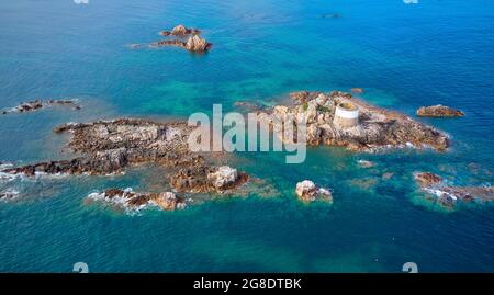 Aerial drone image of Icho Tower at high tide in the sunshine. Jersey Channel Islands. Stock Photo