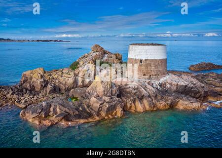 Aerial drone image of Icho Tower at high tide in the sunshine. Jersey Channel Islands. Stock Photo