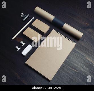 Blank vintage stationery set on wood table background. Responsive design mockup. Stock Photo