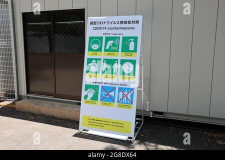 Tokyo, Japan. 19th July, 2021. Covid-19 countermeasures at the Yoyogi National Gymnasium.Tokyo is inside the fourth emergency status and the Tokyo 2020 security measures transformed the Olympic venues into barricaded fortresses. Police, Japanese Self Defense Forces, private security companies and volunteers watch over the stadiums and neighboring streets to prevent the general public to come too close. With these measures the organizers of the Tokyo 2020 Olympic Games try to minimize the health risk posed by the sporting event. Credit: SOPA Images Limited/Alamy Live News Stock Photo