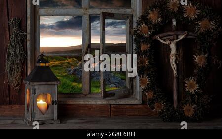 Rustic farmhouse parlor in candlelight, crucifix, Black Forest, Baden-Wuerttemberg, composing, Germany Stock Photo