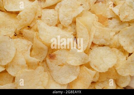 Potato chips close-up background Stock Photo
