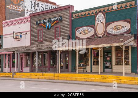 Black Hills National Forest, SD, USA - May 31, 2008: Downtown Hill City Main Street. 3 smaller stores in traditional Western architecture on Main Stre Stock Photo