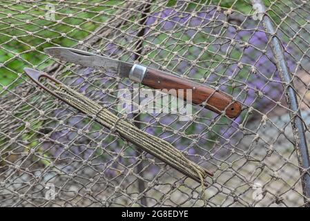 Production tools in a fishing net processing plant, North China Stock ...