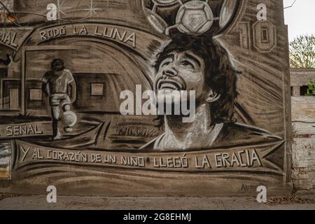 Firmat, Argentina. 19th July, 2021. A mural celebrating the figure of late football legend Diego Armando Maradona is seen in a rural city in the countryside. Maradona died at the age of 60 on November 25, 2020 of severe heart failure in circumstances that are still under investigation. (Photo by Patricio Murphy/SOPA Images/Sipa USA) Credit: Sipa USA/Alamy Live News Stock Photo