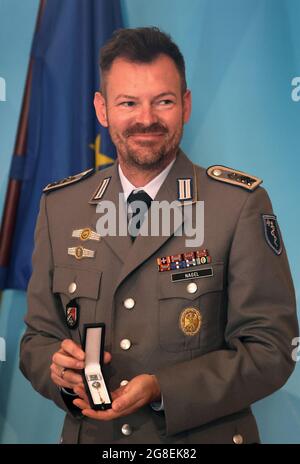 Munich, Germany. 19th July, 2021. Michael Nagel, Sergeant Major of the German Armed Forces, stands in the Bavarian State Chancellery after being awarded the Bavarian Prime Minister's Medal of Honour for soldiers for their service abroad. Credit: Karl-Josef Hildenbrand/dpa/Alamy Live News Stock Photo