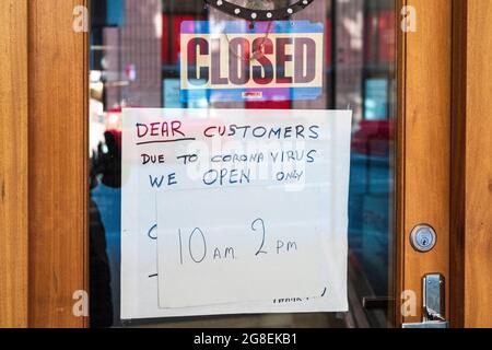 Closed sign on barbershop door during pandemic lockdown in Sydney, Australia Stock Photo