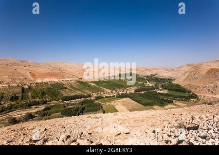View of agricultural fields and local village in highland valley, Zagros mountains, Rudshir-e-Zare, Fars Province, Iran, Persia, Western Asia, Asia Stock Photo