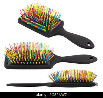 set of different views on new rainbow colorful pastic hair brush isolated on white background. Stock Photo