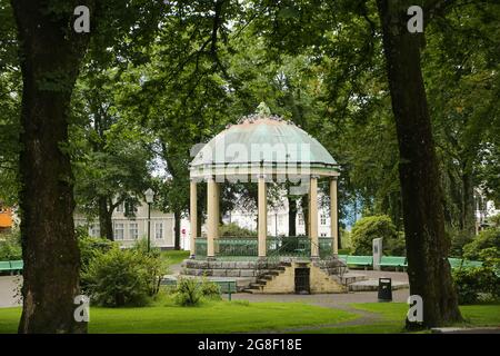 Band stand surrounded by plants and trees in the center of the Byparken, which is a pretty public park in the center of the city of Haugesund, Norway Stock Photo