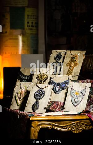 jewelry made of stones and beads in a dark room Stock Photo