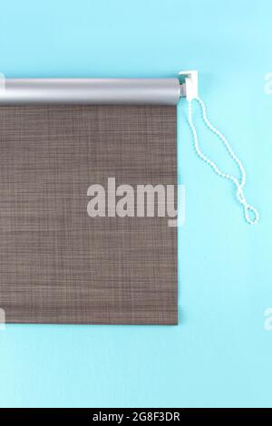 Roller blinds are made from texture material. Color blackout roller blind. Stock Photo