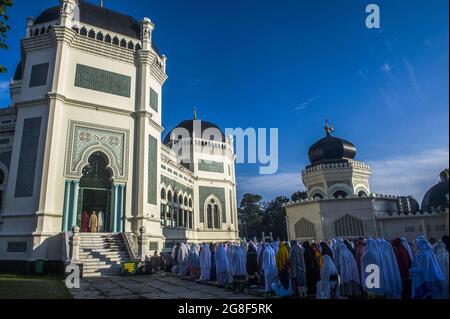 Medan, Indonesia, July 20, 2021: Muslims seen perform Eid Al Adha prayers at the Al-mashun Grand Mosque in Medan, North Sumatra province, Indonesia on July 20, 2021. Photo by Aditya Sutanta/ABACAPRESS.COM Stock Photo