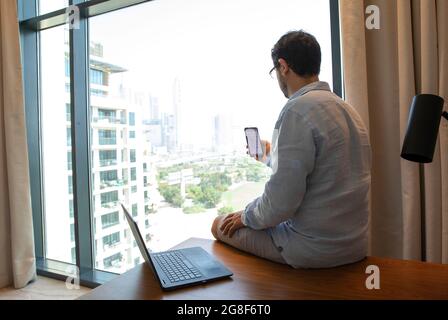 middle aged man working from home Stock Photo
