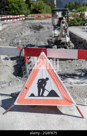 Sign and cordon off a road construction site in Switzerland Stock Photo