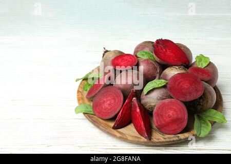 Ripe red beet on white wooden table Stock Photo