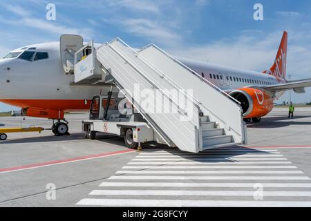 Ukraine, Odessa - July 16, 2021: Passenger aircraft Boeing 737-8Z0 SkyUp Airlines aircraft - UR-SQG at Odessa airport. Travel and flights. Stock Photo