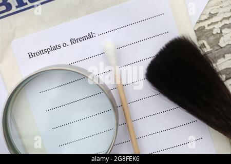 BioPack bag and a forensic cotton swab for securing blood and secretions, which is part of the police's forensic investigation at a crime scene. Stock Photo