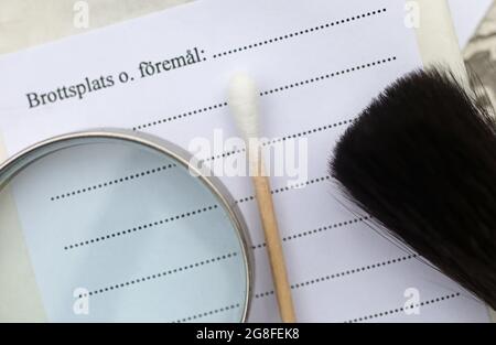 BioPack bag and a forensic cotton swab for securing blood and secretions, which is part of the police's forensic investigation at a crime scene. Stock Photo