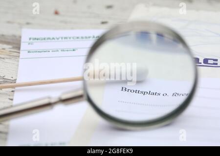 BioPack bag and a forensic cotton swab for securing blood and secretions, which is part of the police's forensic investigation at a crime scene. Stock Photo