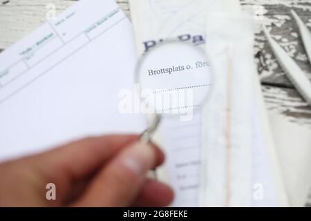 BioPack bag and a forensic cotton swab for securing blood and secretions, which is part of the police's forensic investigation at a crime scene. Stock Photo