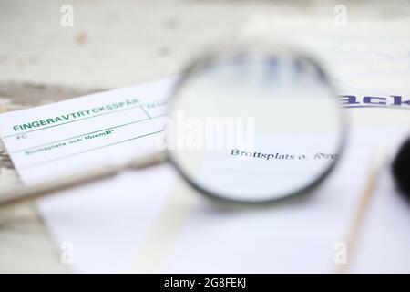 BioPack bag and a forensic cotton swab for securing blood and secretions, which is part of the police's forensic investigation at a crime scene. Stock Photo