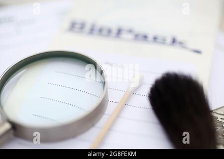 BioPack bag and a forensic cotton swab for securing blood and secretions, which is part of the police's forensic investigation at a crime scene. Stock Photo