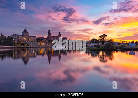 Panorama of Old town with reflection in river Oder at sunset, Szczecin, Poland Stock Photo