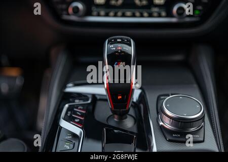 Ukraine, Odessa - July 8, 2021: BMW M5 Competition Pack With Aluminum inserts. Automatic Gear Stick close up. Handle of automatic transmission shift s Stock Photo