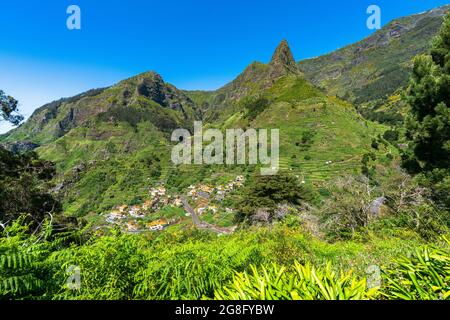 Village of Serra de Agua in the lush vegetation at feet of mountains, Ribeira Brava municipality, Madeira island, Portugal, Atlantic, Europe Stock Photo