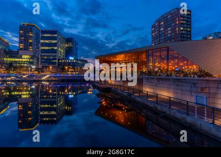 View of MediaCity UK and restaurant at dusk, Salford Quays, Manchester, England, United Kingdom, Europe Stock Photo