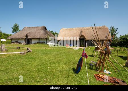 Saxon houses based on excavations from nearby Chalton Saxon Village at Butser Ancient Farm archeological open air museum in Hampshire, England, UK Stock Photo