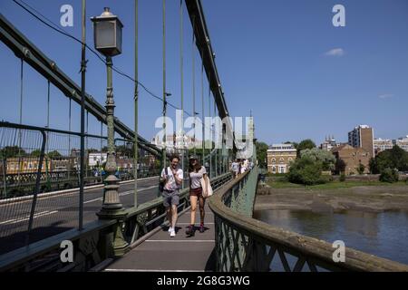 Hammersmith Bridge, the first iron suspension bridge to span the Thames, reopens to cyclists and pedestrians, West London, England, United Kingdom Stock Photo