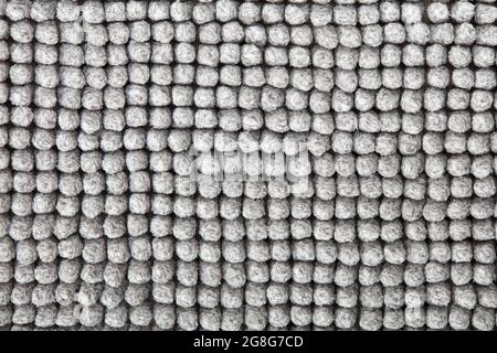 Gray, soft bath mat texture background in natural cotton Stock Photo
