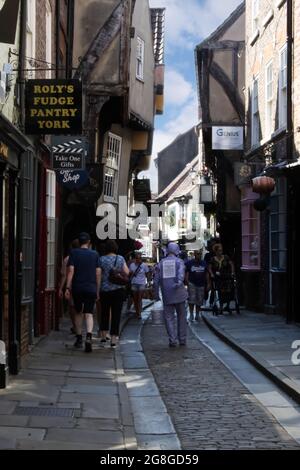 The Shambles, an older part of the city of York, very much on the tourist trail, with its narrow street and overhanging buildings, today there is a op Stock Photo