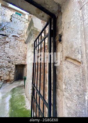 Portal of a house in former Jewish ghetto in Split, Croatia (within Diocletian's Palace) with visible stone fillister, once a mezuzah container Stock Photo