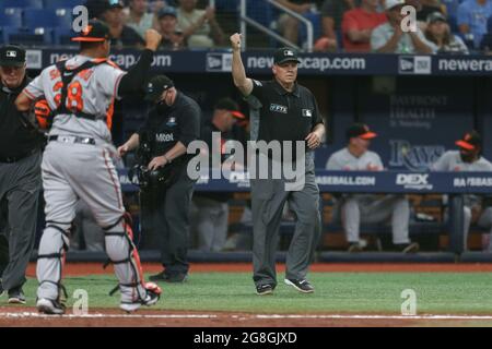 St. Petersburg, FL. USA;  Umpire D.J. Rayburn overturns the call at first and the Baltimore Orioles win the challenge during a major league baseball g Stock Photo