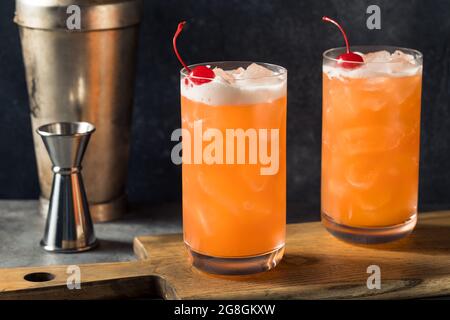 Boozy Refreshing Rum Punch with Lime and Pineapple Stock Photo